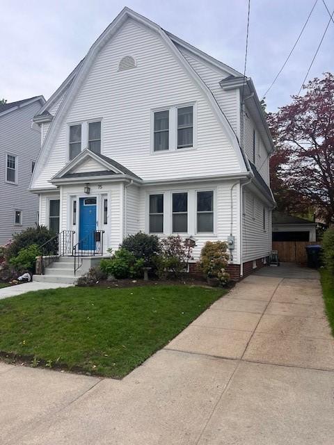 75 Lauriston St, Providence, RI 02906 - dutch colonial with a gambrel roof and a front lawn