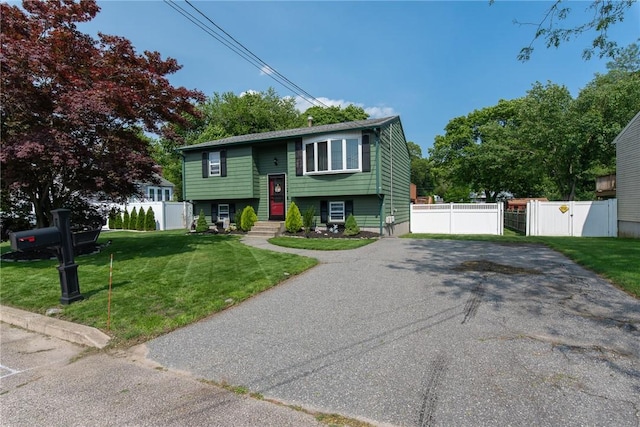 14 Gateway Ct, Warwick, RI 02889 - raised ranch with a gate and asphalt driveway