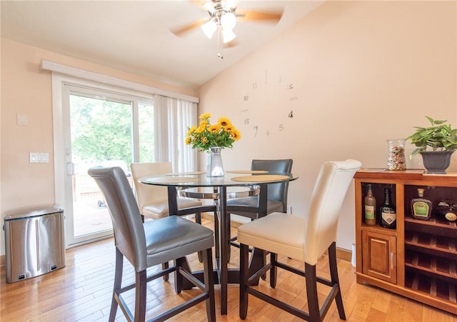 14 Gateway Ct, Warwick, RI 02889 - dining area with light wood finished floors, ceiling fan, and lofted ceiling