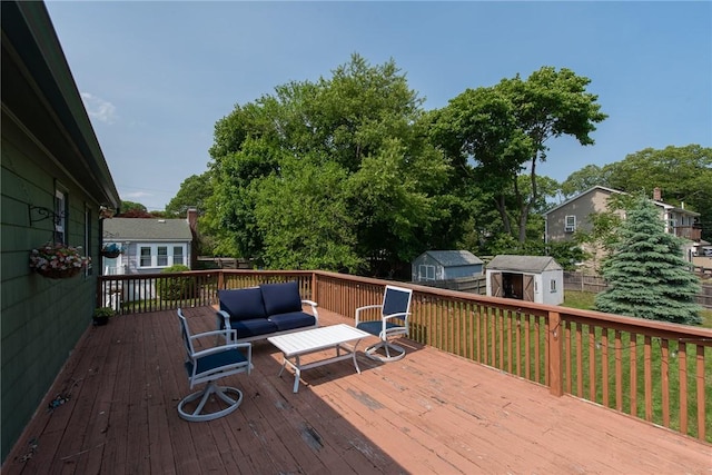 14 Gateway Ct, Warwick, RI 02889 - wooden terrace featuring a storage unit and an outdoor hangout area