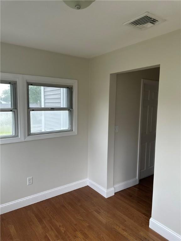 6 Larkspur Rd, Warwick, RI 02886 - empty room featuring baseboards and dark wood finished floors