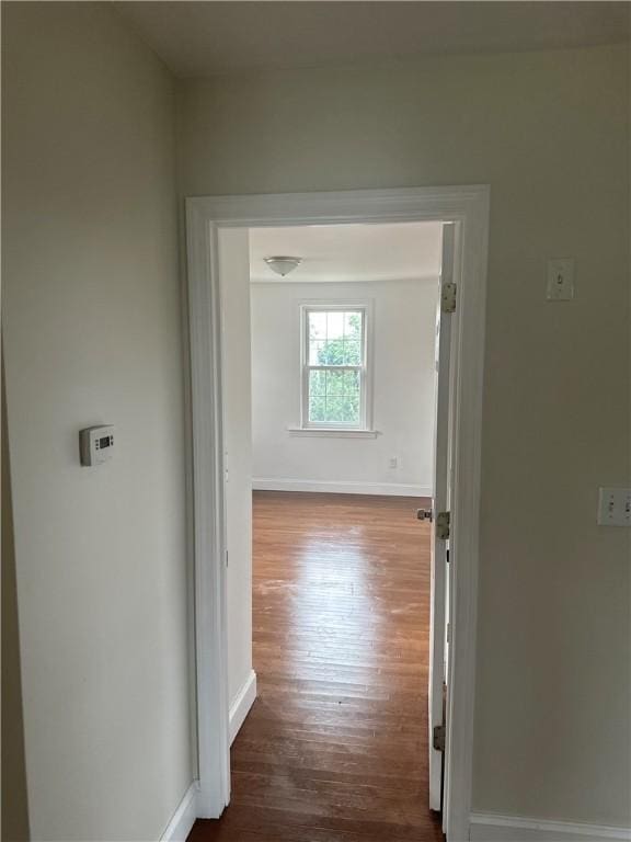 6 Larkspur Rd, Warwick, RI 02886 - hall featuring dark wood-style flooring and baseboards