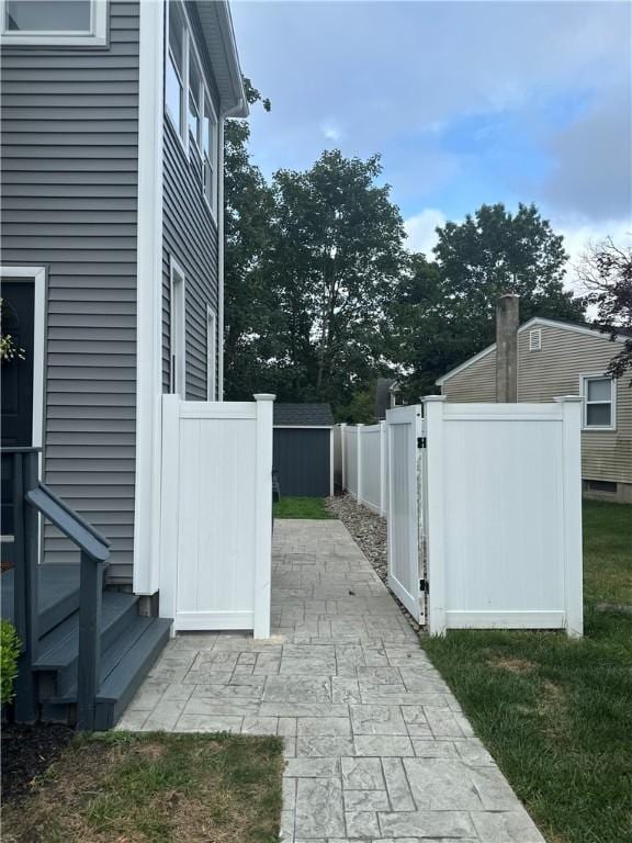6 Larkspur Rd, Warwick, RI 02886 - view of patio featuring a storage unit