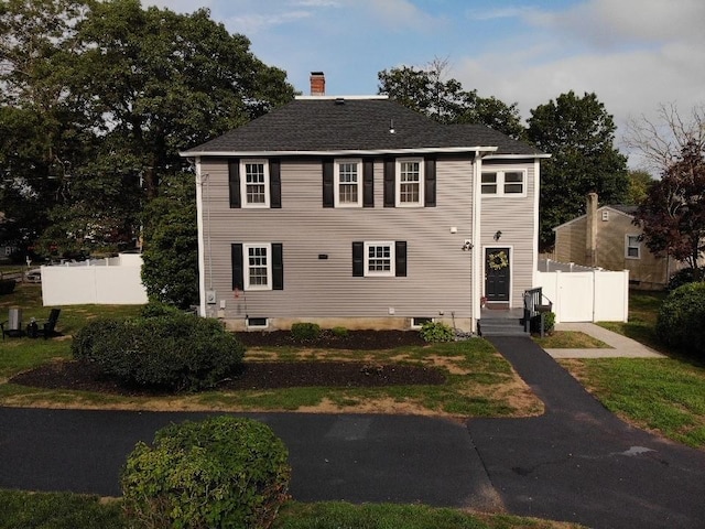 6 Larkspur Rd, Warwick, RI 02886 - view of front facade featuring a chimney