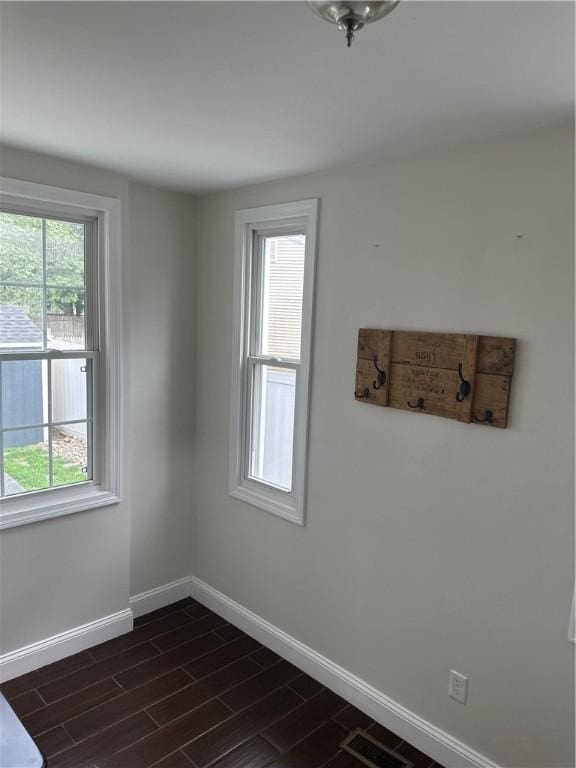 6 Larkspur Rd, Warwick, RI 02886 - empty room with baseboards and wood finish floors