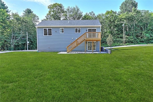 25 Walling Rd, Burrillville, RI 02830 - rear view of house with stairs, a yard, and a deck