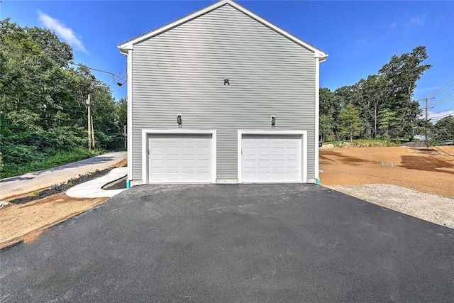 25 Walling Rd, Burrillville, RI 02830 - garage with asphalt driveway