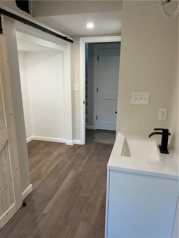 25 Walling Rd, Burrillville, RI 02830 - bathroom featuring wood finished floors, double vanity, and recessed lighting