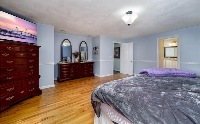 2 Elizabeth Ann Dr, Johnston, RI 02919 - bedroom featuring light wood-style floors and baseboards