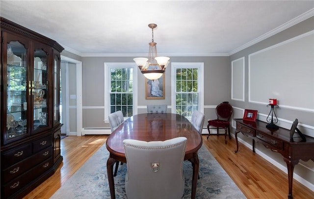 2 Elizabeth Ann Dr, Johnston, RI 02919 - dining space featuring a baseboard radiator, a baseboard heating unit, light wood-style flooring, a chandelier, and ornamental molding