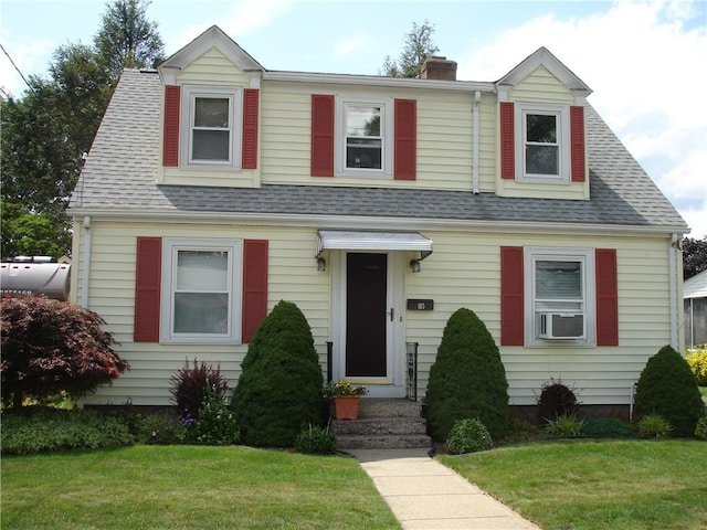 115 Slater Park Ave, Pawtucket, RI 02861 - view of front facade with a front lawn, a shingled roof, and a chimney