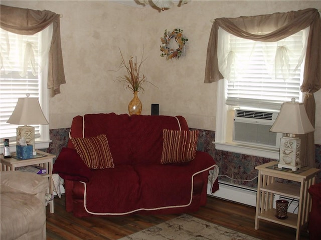 115 Slater Park Ave, Pawtucket, RI 02861 - living area with baseboard heating and wood finished floors