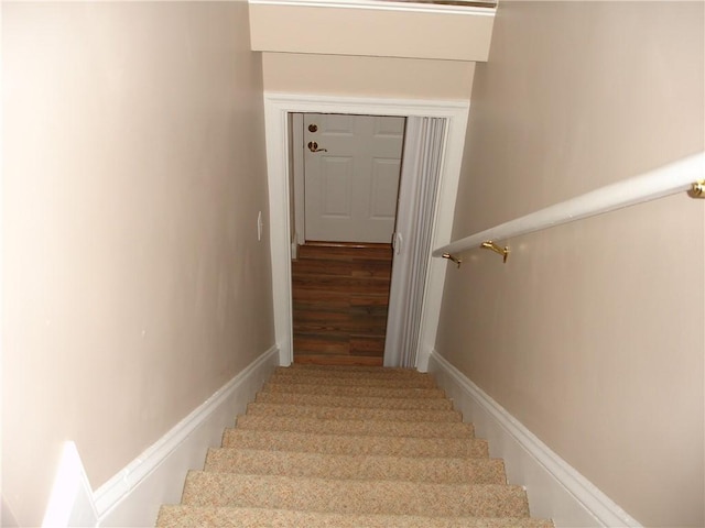 115 Slater Park Ave, Pawtucket, RI 02861 - stairway featuring baseboards