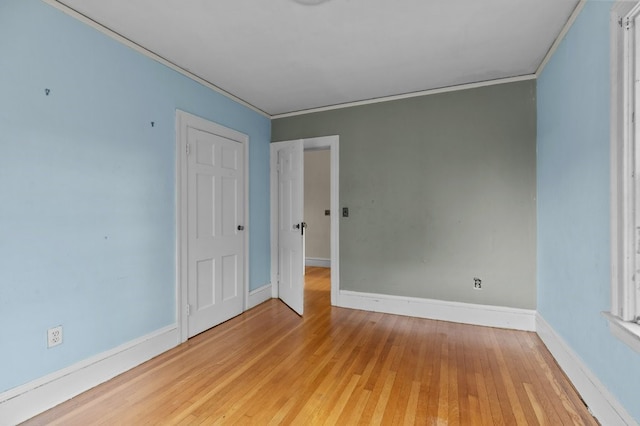 189 Butler Ave, Providence, RI 02906 - unfurnished room with light wood-style flooring and crown molding