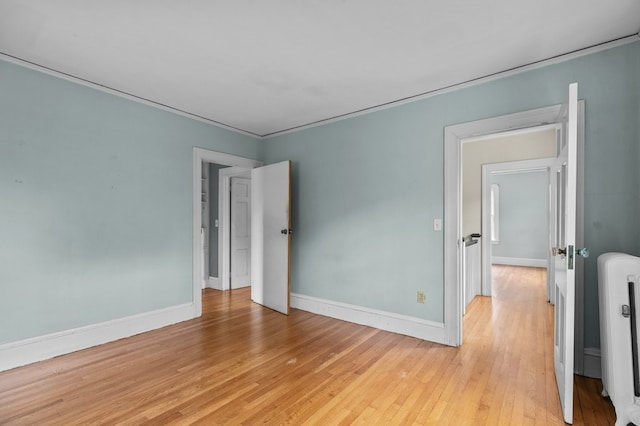 189 Butler Ave, Providence, RI 02906 - empty room with light wood-style floors and baseboards