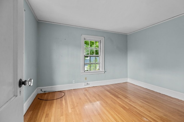 189 Butler Ave, Providence, RI 02906 - spare room with hardwood / wood-style flooring and crown molding