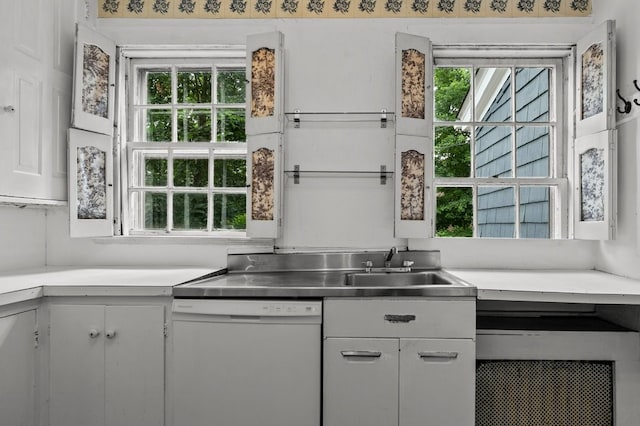 189 Butler Ave, Providence, RI 02906 - kitchen with white dishwasher, healthy amount of natural light, and stainless steel countertops