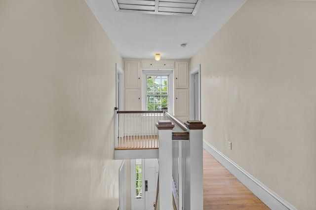 189 Butler Ave, Providence, RI 02906 - hallway featuring light wood-type flooring and an upstairs landing