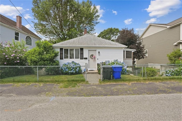 12 Elmore Ave, North Providence, RI 02911 - view of front of property featuring a chimney and a shingled roof