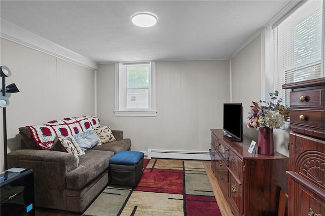 12 Elmore Ave, North Providence, RI 02911 - living room with a baseboard heating unit and wood finished floors