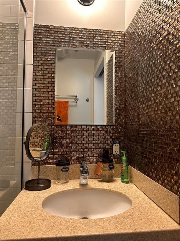 65 Weybosset St Unit 314, Providence, RI 02903 - full bath with vanity, decorative backsplash, and a shower