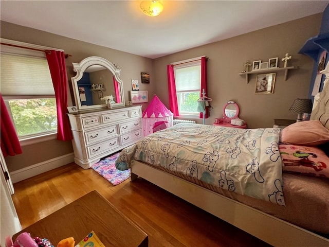 55 Greylock Ave, Cranston, RI 02910 - bedroom featuring multiple windows and wood finished floors