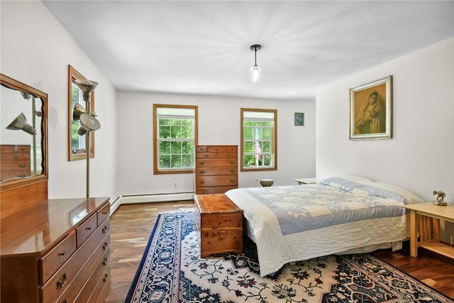 6 Ferris Dr, Coventry, RI 02816 - bedroom with a baseboard radiator and wood finished floors