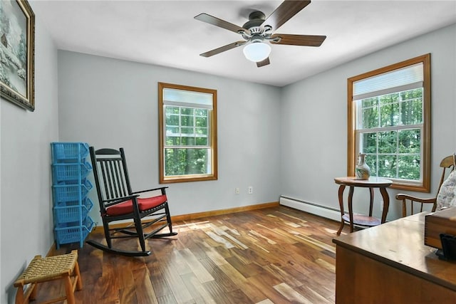 6 Ferris Dr, Coventry, RI 02816 - sitting room with plenty of natural light, wood finished floors, and a ceiling fan