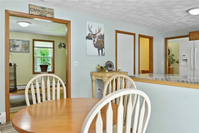 6 Ferris Dr, Coventry, RI 02816 - dining space featuring a baseboard radiator