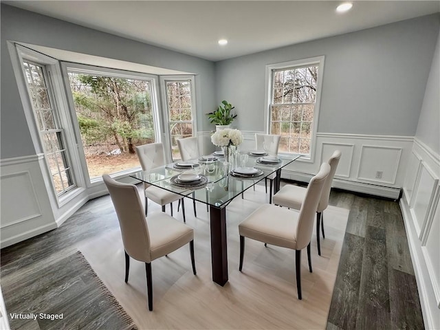 20 Biscuit Hill Rd, Foster, RI 02825 - dining space featuring healthy amount of natural light, wainscoting, wood finished floors, a decorative wall, and recessed lighting