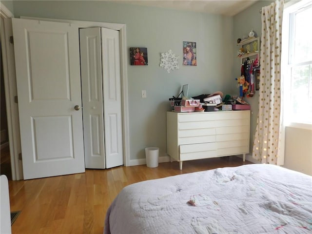 476 Ledge Rd, Coventry, RI 02816 - bedroom featuring wood finished floors and a closet
