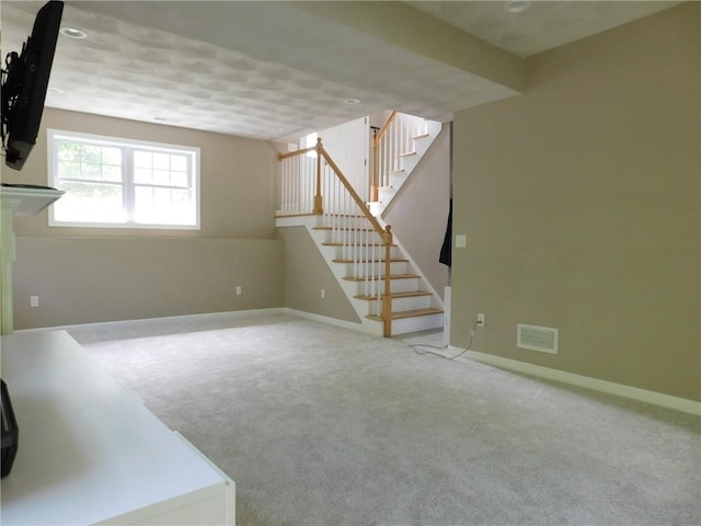 476 Ledge Rd, Coventry, RI 02816 - basement featuring stairway and carpet flooring