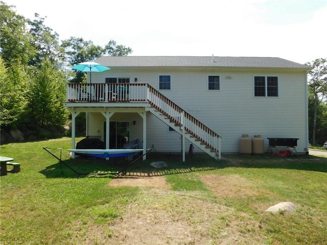 476 Ledge Rd, Coventry, RI 02816 - back of property with stairway, a wooden deck, and a yard