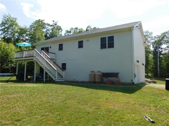 476 Ledge Rd, Coventry, RI 02816 - back of house with stairway, a wooden deck, and a lawn