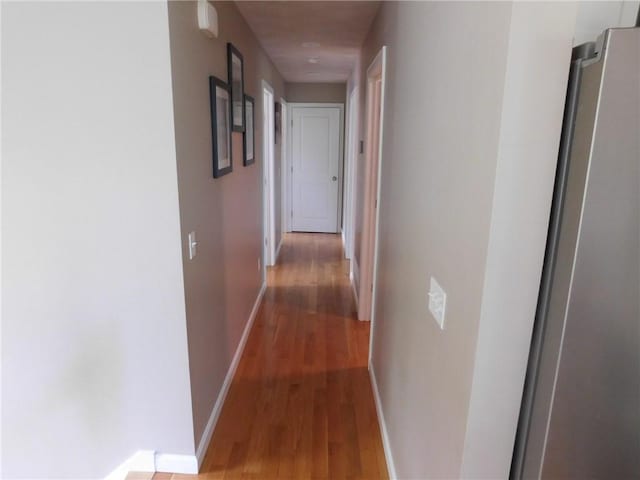 476 Ledge Rd, Coventry, RI 02816 - corridor featuring light wood-style flooring and baseboards