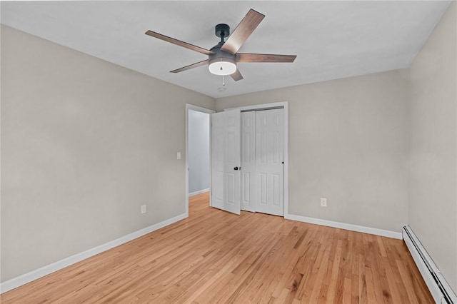 7 Antony Ave, Bristol, RI 02809 - unfurnished bedroom featuring a baseboard heating unit, light wood-type flooring, a closet, and a ceiling fan