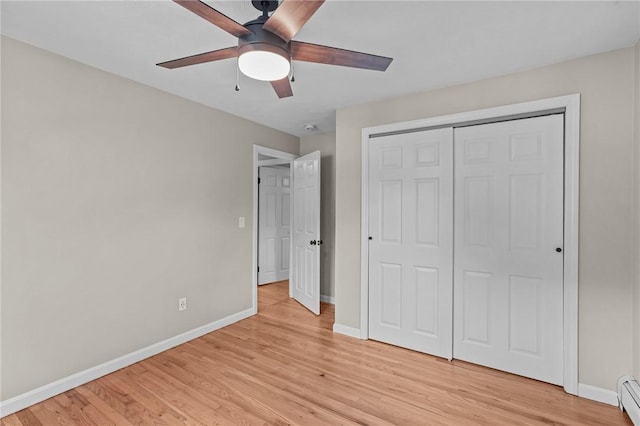7 Antony Ave, Bristol, RI 02809 - unfurnished bedroom with a baseboard heating unit, light wood finished floors, a closet, and ceiling fan