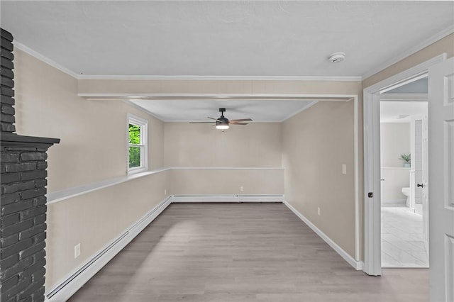 7 Antony Ave, Bristol, RI 02809 - spare room featuring a baseboard heating unit, a ceiling fan, a smoke detector, wood finished floors, and crown molding