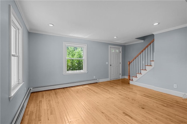 14 Gladding St, Bristol, RI 02809 - foyer featuring baseboard heating, ornamental molding, hardwood / wood-style flooring, stairs, and recessed lighting
