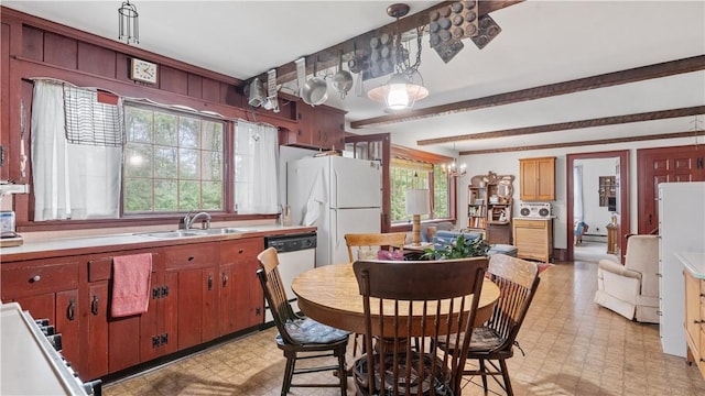 12 Lampercock Ln, Lincoln, RI 02865 - kitchen featuring white appliances, light flooring, beamed ceiling, light countertops, and hanging light fixtures