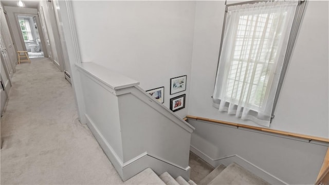 12 Lampercock Ln, Lincoln, RI 02865 - stairway with carpet and baseboard heating