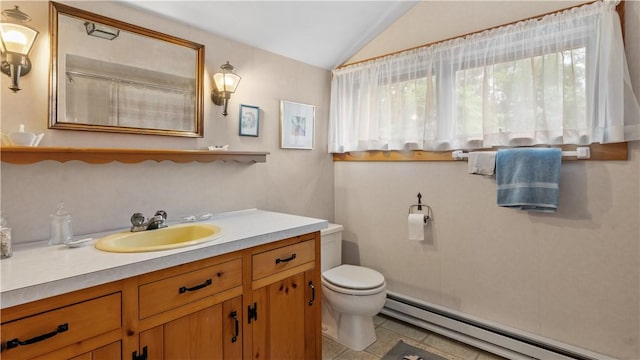 12 Lampercock Ln, Lincoln, RI 02865 - bathroom featuring a baseboard heating unit, lofted ceiling, vanity, a shower, and tile patterned floors