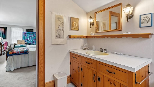 12 Lampercock Ln, Lincoln, RI 02865 - bathroom with vanity, ensuite bathroom, and lofted ceiling
