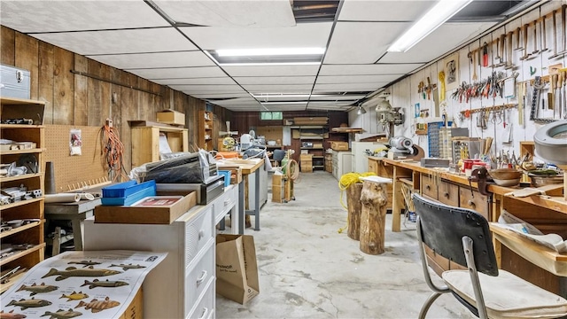 12 Lampercock Ln, Lincoln, RI 02865 - misc room featuring a workshop area, concrete floors, and wooden walls