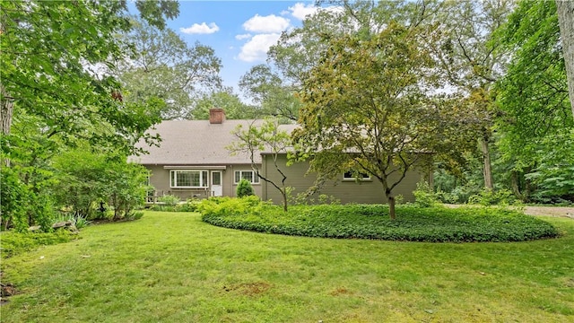 12 Lampercock Ln, Lincoln, RI 02865 - view of front of home with a chimney and a front yard