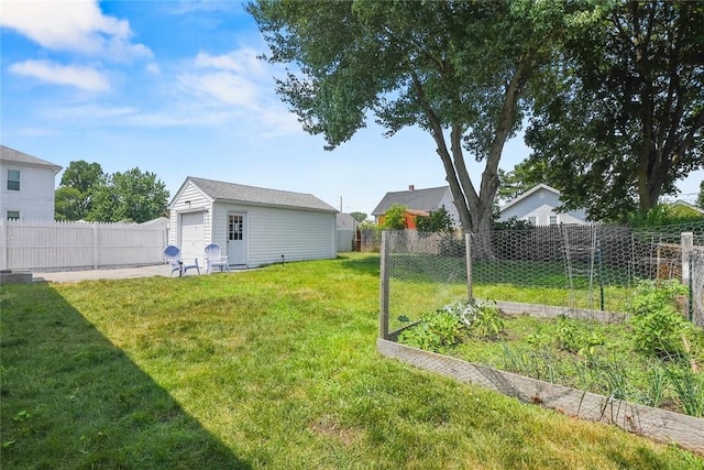 62 Bristol Ave, Pawtucket, RI 02861 - view of yard featuring a garden, an outdoor structure, and a detached garage