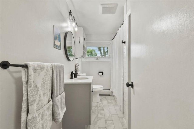 62 Bristol Ave, Pawtucket, RI 02861 - full bath with marble look tiles, vanity, a baseboard heating unit, and a shower with curtain