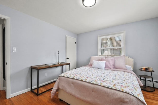 62 Bristol Ave, Pawtucket, RI 02861 - bedroom with wood finished floors and baseboard heating