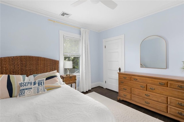 157 Arnold Ave, Cranston, RI 02905 - bedroom with dark wood-style floors, ornamental molding, and ceiling fan