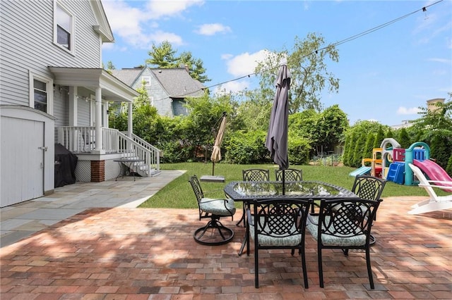 157 Arnold Ave, Cranston, RI 02905 - view of patio / terrace featuring outdoor dining space and a playground